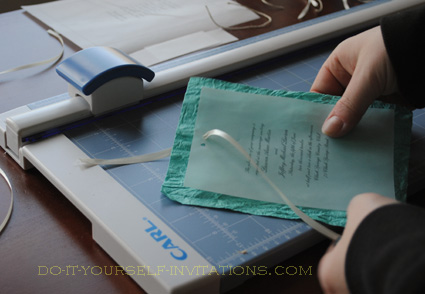 diy handmade paper wedding invitations Tie the ribbon in a bow and you're